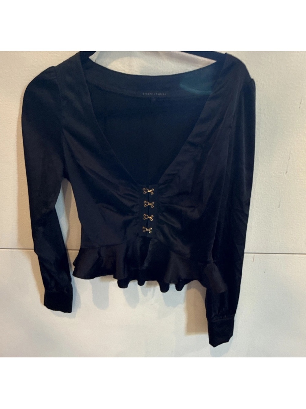 Black Long-Sleeve Satin Peplum Top with Hook Closure